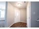 Clean entryway featuring neutral walls, stylish tile flooring, and a convenient closet space at 4545 Connaught East Dr, Plainfield, IN 46168