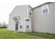 Charming two-story home featuring neutral siding, manicured lawn, and a welcoming entrance at 4545 Connaught East Dr, Plainfield, IN 46168