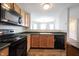 Updated kitchen featuring modern appliances and a functional layout, making cooking and cleaning a breeze at 4545 Connaught East Dr, Plainfield, IN 46168