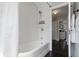 Bright bathroom featuring a subway tile surround shower and modern fixtures at 4640 Boulevard Pl, Indianapolis, IN 46208