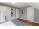 Light filled main bedroom with built-in shelves, access to the ensuite, and large closet space at 4640 Boulevard Pl, Indianapolis, IN 46208
