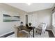 Cozy office with accent painting, chair, and neutral paint at 4640 Boulevard Pl, Indianapolis, IN 46208