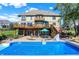 A lovely home exterior featuring a pool and deck with seating for outdoor enjoyment at 4843 Snowberry Bay Ct, Carmel, IN 46033