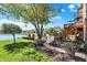 Backyard view featuring a lake, a dock, a pool and a deck with stairs to the second story at 4843 Snowberry Bay Ct, Carmel, IN 46033