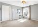 Spacious bedroom with neutral walls and window view, offering a blank canvas for personalization at 4843 Snowberry Bay Ct, Carmel, IN 46033