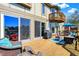 Spacious deck offers seamless indoor-outdoor living with comfortable seating, lake views, and access to the home's interior at 4843 Snowberry Bay Ct, Carmel, IN 46033