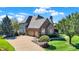 Two-story home with well-manicured lawn, beautiful landscaping, and a two-car garage at 4843 Snowberry Bay Ct, Carmel, IN 46033