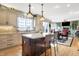Bright kitchen with island seating and stainless-steel appliances at 4843 Snowberry Bay Ct, Carmel, IN 46033