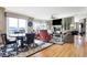 Open living room area with fireplace, large windows, and comfortable seating at 4843 Snowberry Bay Ct, Carmel, IN 46033