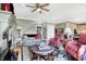 Spacious living room with a fireplace, hardwood floors, and comfortable seating at 4843 Snowberry Bay Ct, Carmel, IN 46033