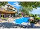 Picturesque backyard with in-ground pool, patio and greenery, perfect for outdoor gatherings at 4843 Snowberry Bay Ct, Carmel, IN 46033