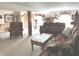 Cozy finished basement space with comfortable seating, exercise equipment and a neutral carpet at 5210 S 100 E Rd, Anderson, IN 46013