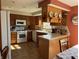 Spacious kitchen with white appliances, light countertops, and oak cabinets at 5210 S 100 E Rd, Anderson, IN 46013
