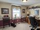 Charming home office with natural light, wainscoting, and ample workspace at 5210 S 100 E Rd, Anderson, IN 46013