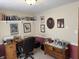 Inviting home office featuring built-in shelves, a comfortable desk, and neutral decor at 5210 S 100 E Rd, Anderson, IN 46013