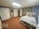 Spacious bedroom with carpet and a large closet, perfect for storage at 6036 Chinkapin Dr, Columbus, IN 47201