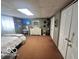 Bedroom featuring a bed, carpet, and closet for storage solutions at 6036 Chinkapin Dr, Columbus, IN 47201