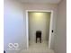 Neutral hallway area featuring tile floors and recessed lighting at 6036 Chinkapin Dr, Columbus, IN 47201