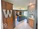 Charming kitchen features a large island, stainless steel appliances, and custom cabinets at 6036 Chinkapin Dr, Columbus, IN 47201