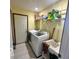 Practical laundry room features a washing machine, dryer and utility sink at 6036 Chinkapin Dr, Columbus, IN 47201