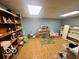 Fun-filled playroom with a play house, toys, storage, and patterned floor at 6036 Chinkapin Dr, Columbus, IN 47201