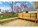 Wooden deck offers a place to relax and enjoy views of the backyard at 604 Wood St, Greenfield, IN 46140