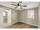 Bedroom with wood floors, neutral walls, and ceiling fan at 604 Wood St, Greenfield, IN 46140