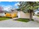 This home has a convenient gravel driveway, new wooden deck, and an exterior storage unit at 604 Wood St, Greenfield, IN 46140
