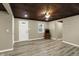 Living room with durable floors, wood ceiling, and neutral walls at 604 Wood St, Greenfield, IN 46140