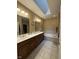 Bathroom with dual vanity and soaking tub at 6087 Boulder Ct, Columbus, IN 47201