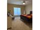 Neutral bedroom with ceiling fan, and light-blocking window shades at 6087 Boulder Ct, Columbus, IN 47201