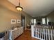 Bright entryway leading to a spacious living room with hardwood floors and a fireplace at 6087 Boulder Ct, Columbus, IN 47201