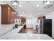 Spacious kitchen featuring ample counter space with marble countertops, stainless steel appliances, and wooden floors at 6150 Red Day Rd, Martinsville, IN 46151