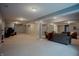 Spacious finished basement featuring neutral walls, carpet floors, recessed lighting, and more seating at 6717 Marble Arch Way, Indianapolis, IN 46259