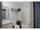 Cozy bathroom features a shower/tub combo, vanity, and mirrored cabinet for storage and personal care items at 6717 Marble Arch Way, Indianapolis, IN 46259