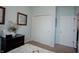 Bright bedroom featuring neutral walls, carpet floors, closet, and stylish decor at 6717 Marble Arch Way, Indianapolis, IN 46259