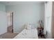 This bedroom has a neutral paint, lots of light and a cute quilt at 6717 Marble Arch Way, Indianapolis, IN 46259