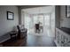 Bright dining room with hardwood floors and lots of windows at 6717 Marble Arch Way, Indianapolis, IN 46259