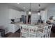 Beautiful kitchen featuring white cabinetry, granite counters, and stainless appliances at 6717 Marble Arch Way, Indianapolis, IN 46259