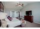 The main bedroom is spacious and has a closet and bathrom access at 6717 Marble Arch Way, Indianapolis, IN 46259