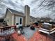 Relax in the backyard, complete with a deck, furniture, grill, and chimney for outdoor enjoyment at 676 Sunblest Blvd, Fishers, IN 46038