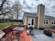A backyard features a grill, a firepit, a patio and a deck for outdoor entertainment at 676 Sunblest Blvd, Fishers, IN 46038