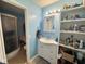 Bright bathroom with a white vanity, a framed mirror, and a glass-door shower, providing a clean, functional space at 676 Sunblest Blvd, Fishers, IN 46038