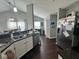 A spacious kitchen with stainless steel appliances, granite countertops, and hardwood floors is ready to enjoy at 676 Sunblest Blvd, Fishers, IN 46038