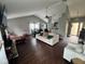 Spacious living room with hardwood floors and high ceilings, providing a bright and inviting space for relaxation and entertainment at 676 Sunblest Blvd, Fishers, IN 46038