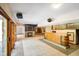 Finished basement has a bar, fireplace, and sliding glass doors to access the backyard at 6780 E Woodland Ct, Mooresville, IN 46158