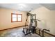 Basement featuring an exercise equipment area with a window for natural light at 6780 E Woodland Ct, Mooresville, IN 46158
