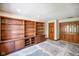 Unfinished basement provides ample space with two storage closets and built in shelving at 6780 E Woodland Ct, Mooresville, IN 46158