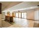 Finished basement has a bar, fireplace, and sliding glass doors to access the backyard at 6780 E Woodland Ct, Mooresville, IN 46158