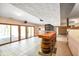 Finished basement has a bar, fireplace, and sliding glass doors to access the backyard at 6780 E Woodland Ct, Mooresville, IN 46158